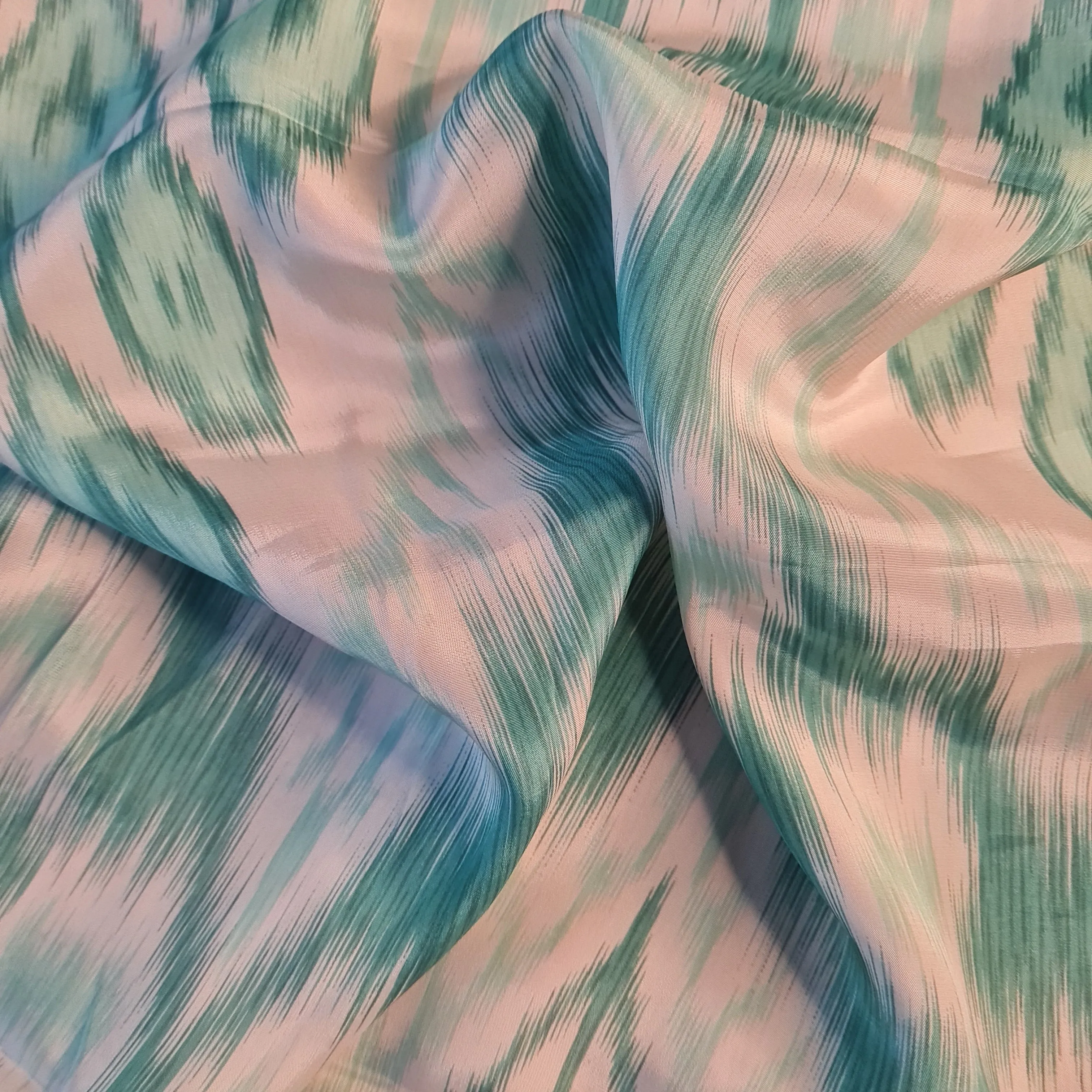 Exclusive Green Multicolor Ikkat Print Crepe Fabric